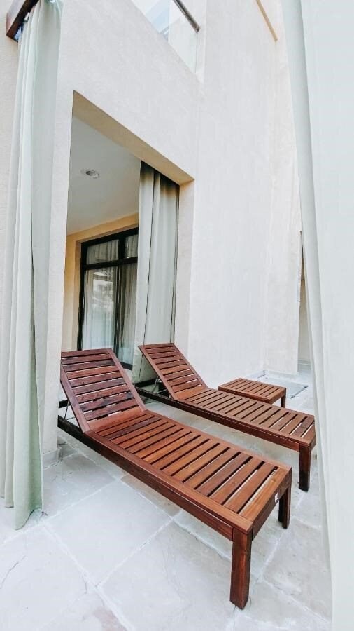 Вид Mina Al Fajer Villas 4*